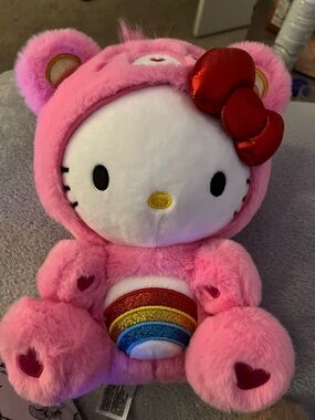 Care Bears x Hello Kitty Pink Plush with Red Bow and Rainbow Belly